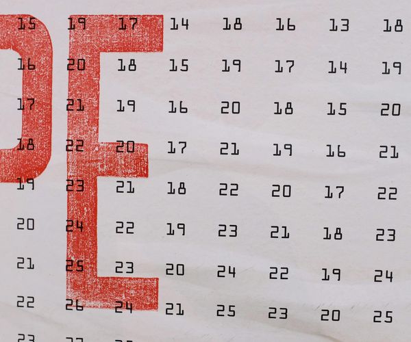 A simple calendar with several days marked, symbolizing consistency.